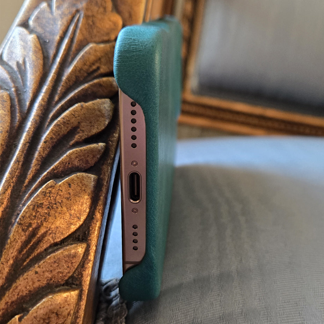 LUMAZI Pharaonic Turquoise handmade, full-grain leather iPhone 16 Pro Max case bottom.