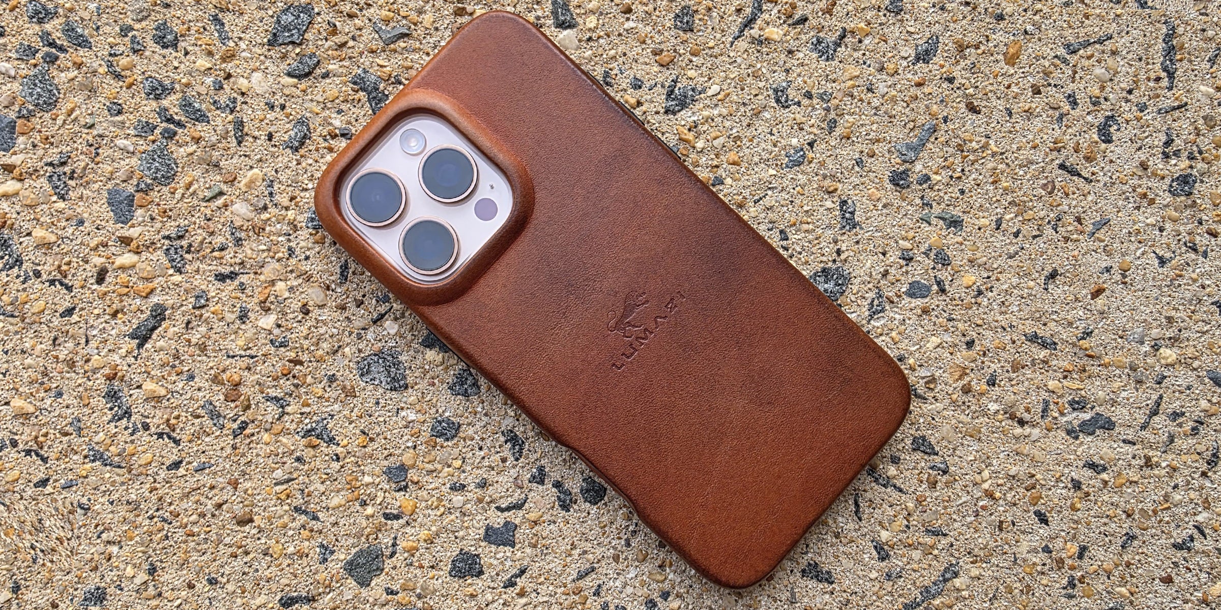 LUMAZI sienna brown, handmade, full grain leather iPhone case with MagSafe, after patina.